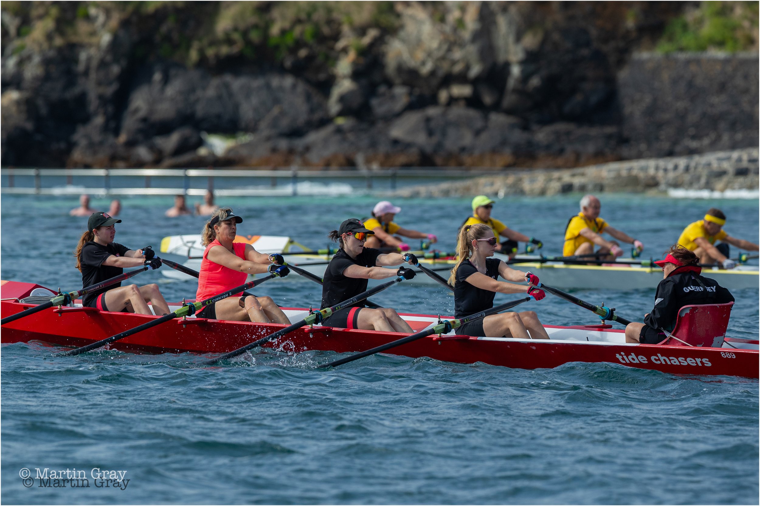 99 TCS Tide Chasers and 7 Cool Runnings battle it out at the start in Havelet Bay-4575.jpg