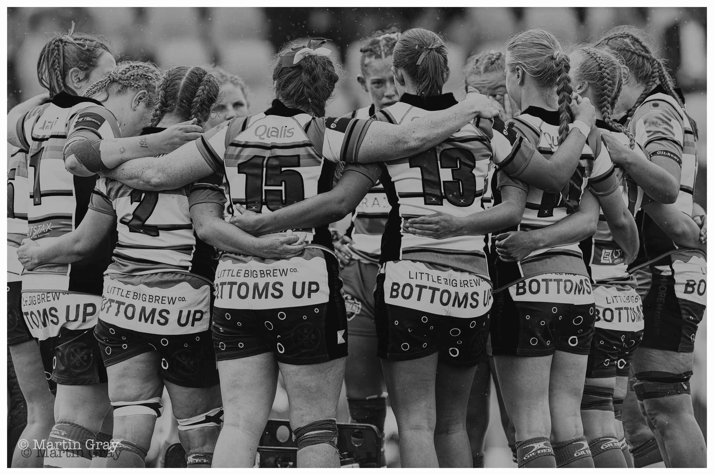 Raiders ladies team huddle B+W-2.jpg