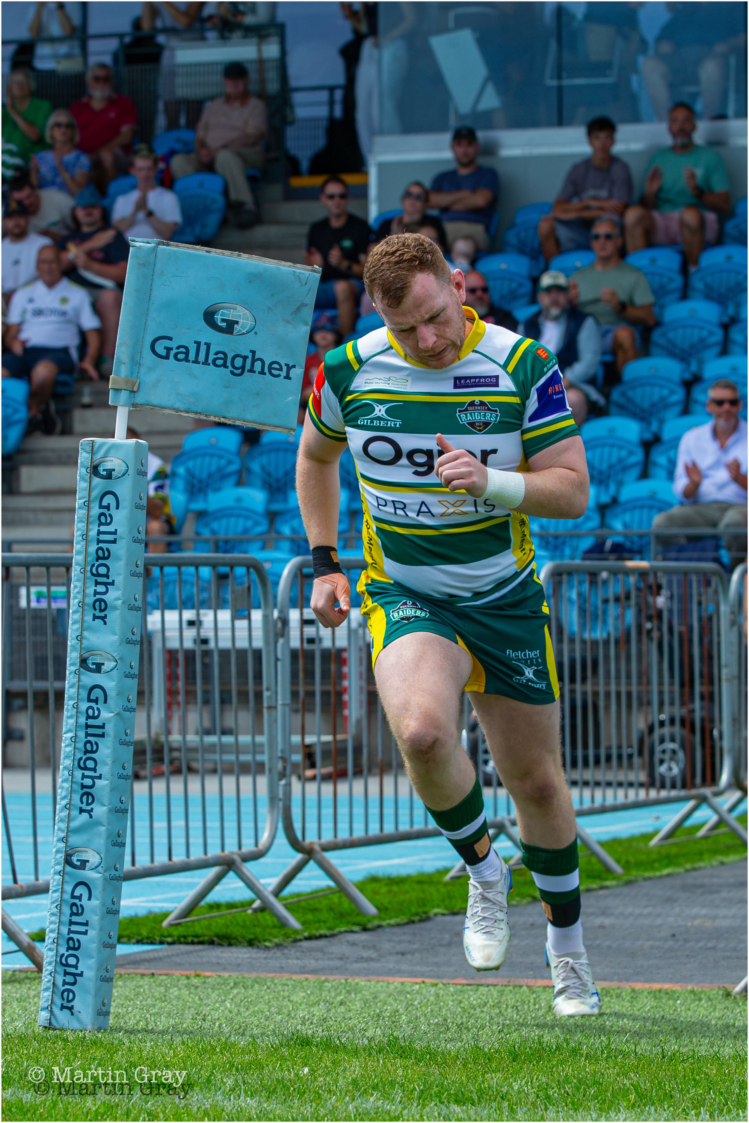 Dom Rice leads out the Guernsey Raiders-9997.jpg