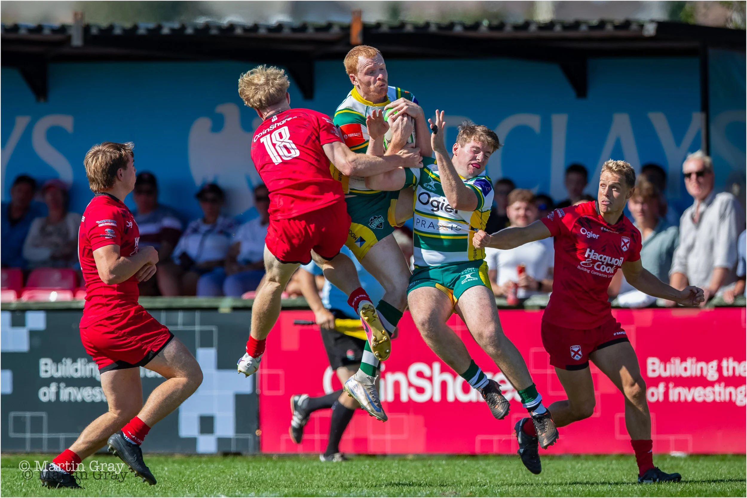 Matt Armstrong wins an aerial contest with support from Niall McGann-7788.jpg