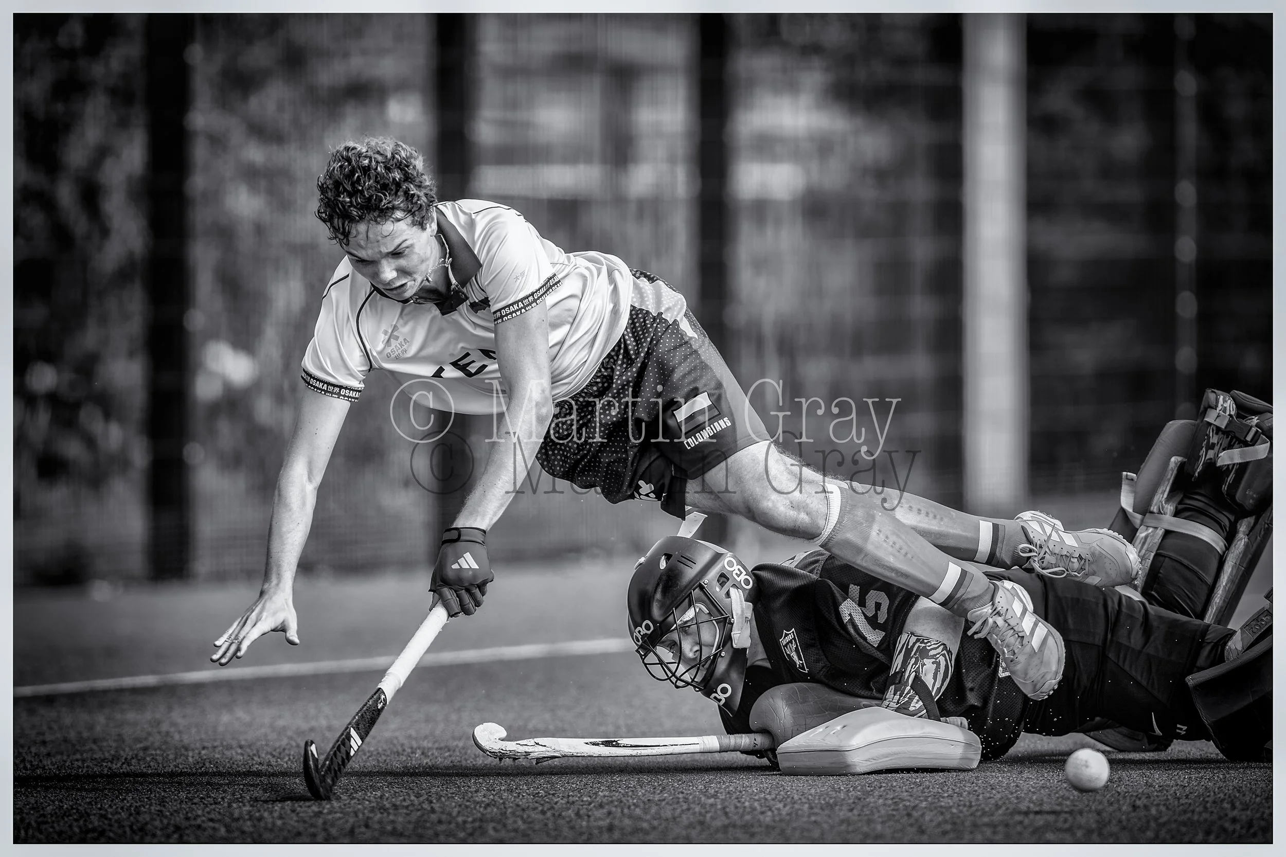 Dan Cameron is brought down resulting in a penalty stroke B+W-2.jpg