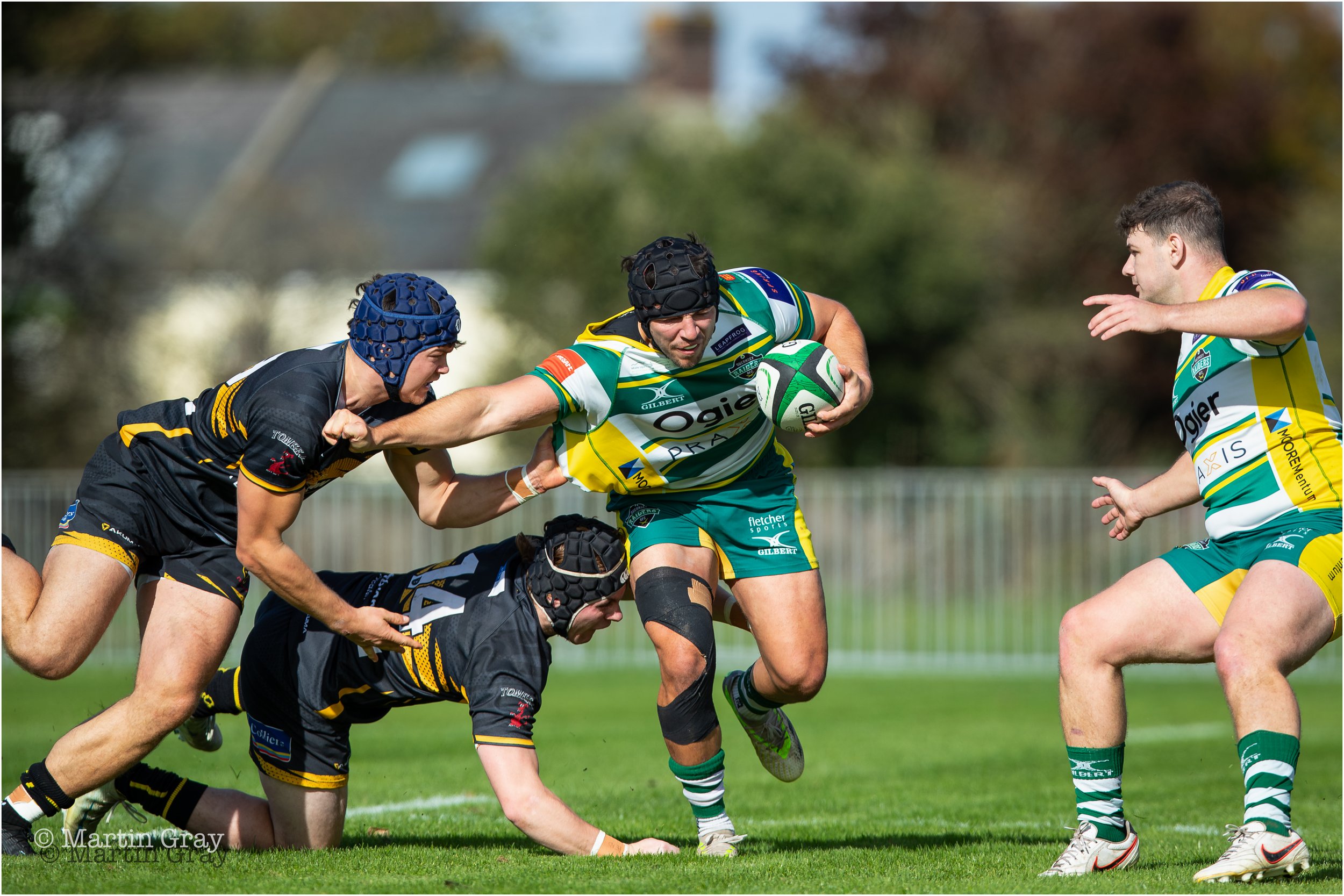 Jonathan Dawe hands off two tackles-2799.jpg