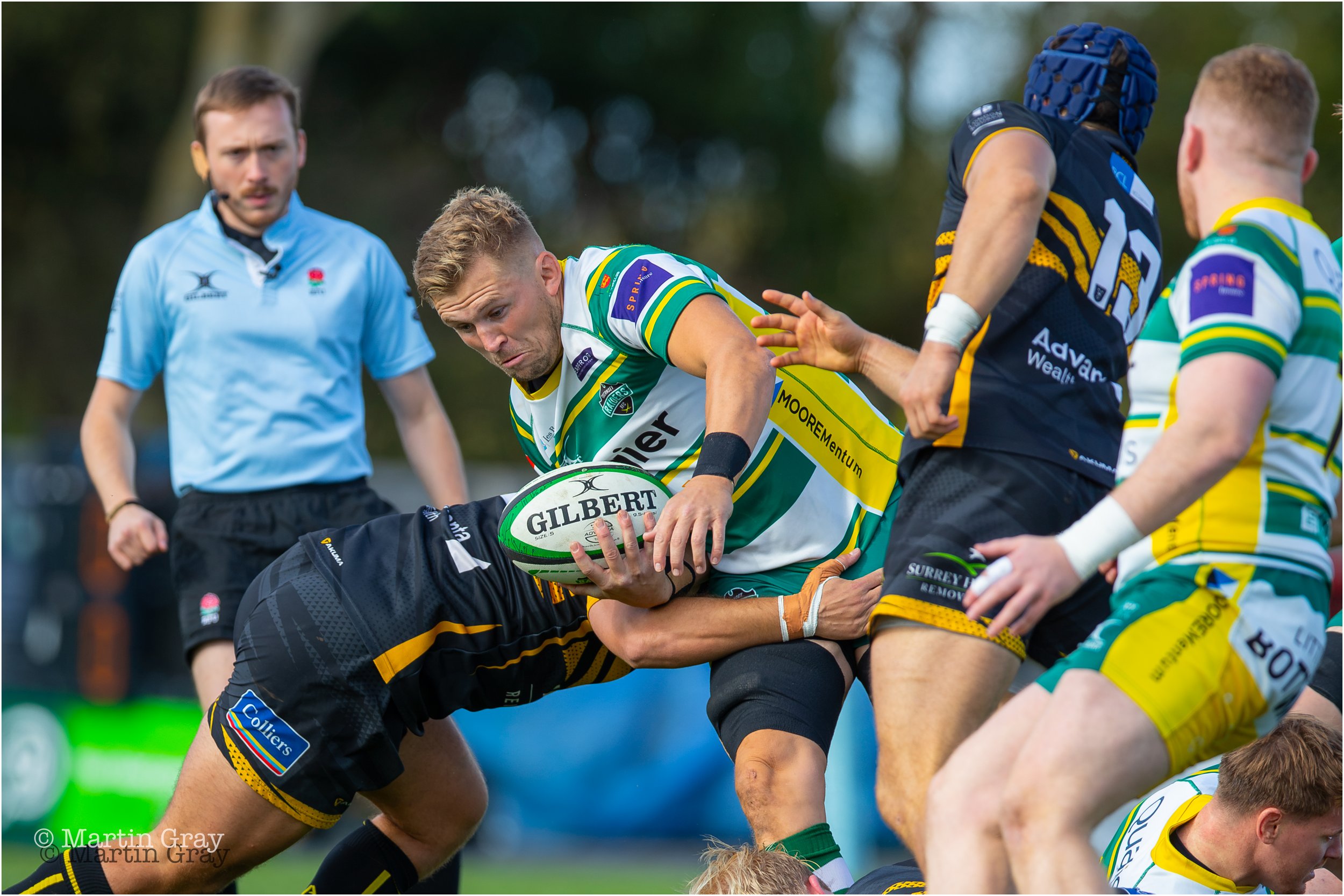 Josh Poullet powers through a tackle-2747.jpg