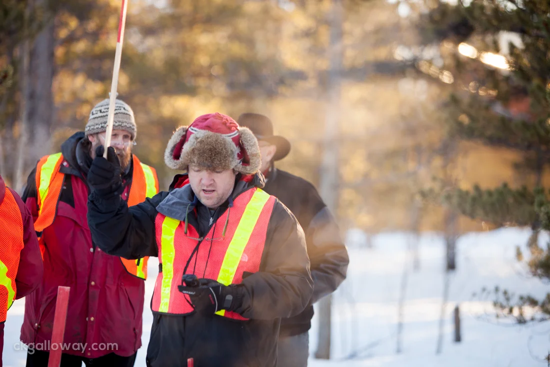 Richard counting down the start for a dog sled team.