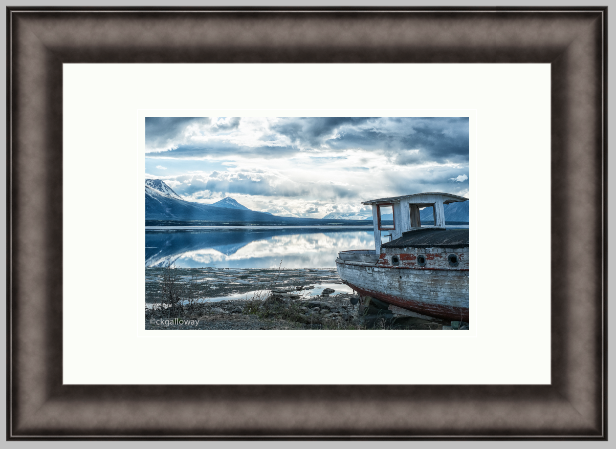 Abandoned Boat, 12" X 18" iron frame, 8" X 12" print with a double white mat. $190