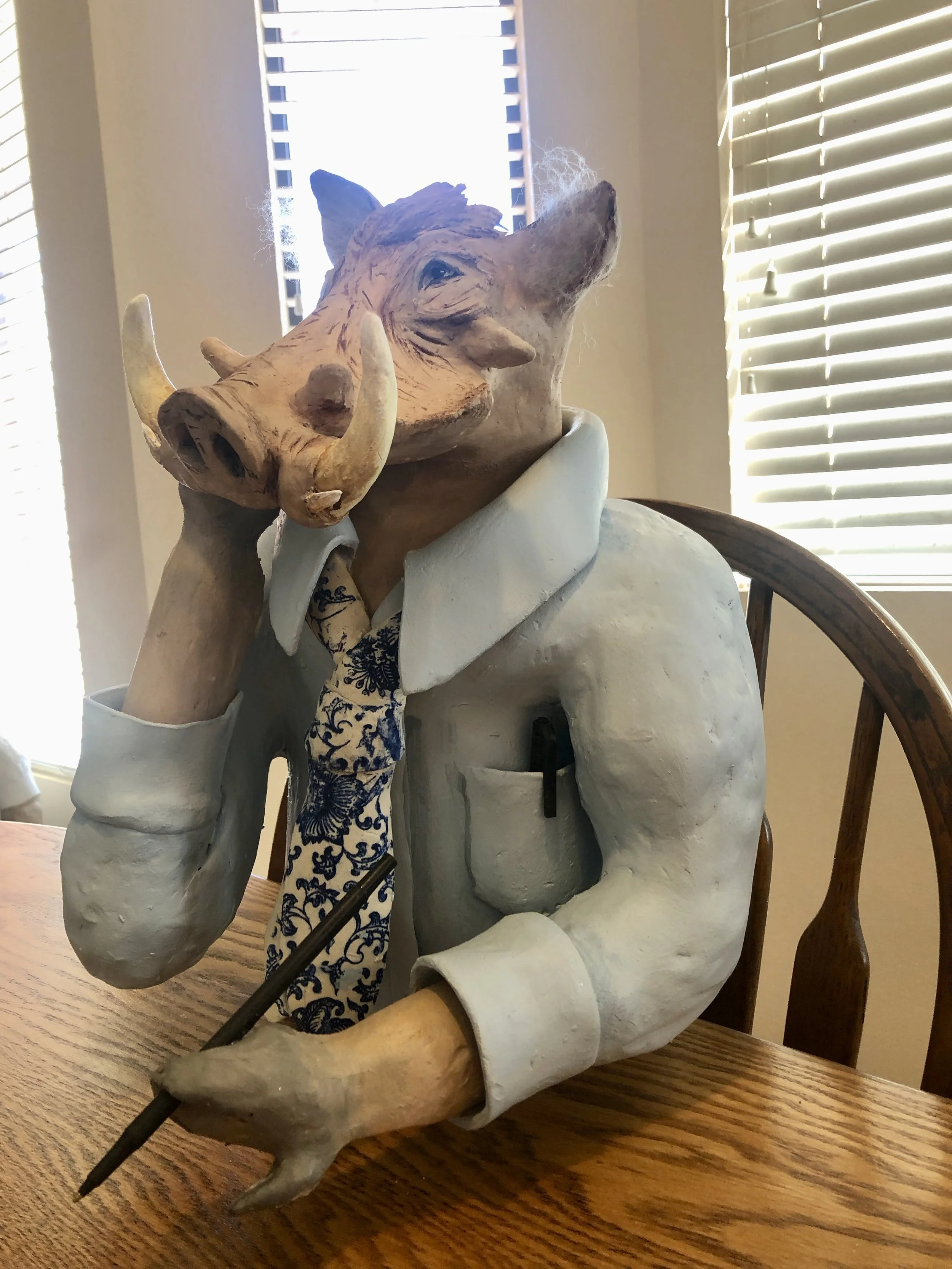 Mort waiting for the meeting to be over