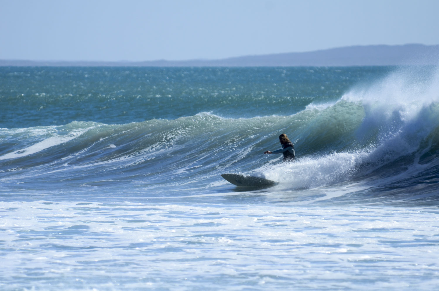 Matty surfing an empty right hander in Baja.