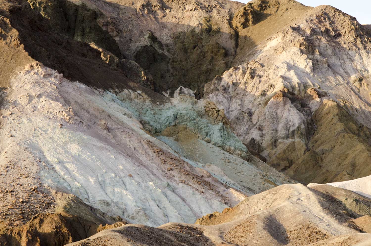 Beautiful palette of minerals coloring the sand