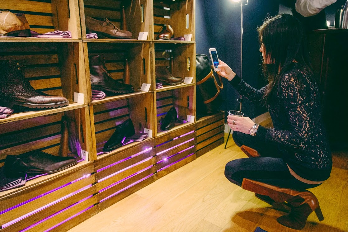 That's me, checking out the shoes at the Paul Drish launch party. 