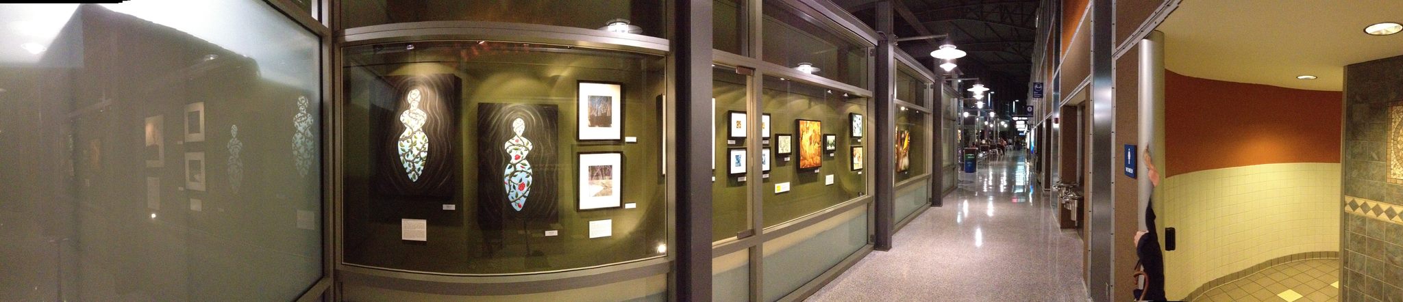 Austin-Bergstrom International Airport, Austin, TX, 2013. Sponsored by GenerousArt.org . Panoramic view shown with artists Judith Simonds , Kerry Schroeder, and Emily Moores .