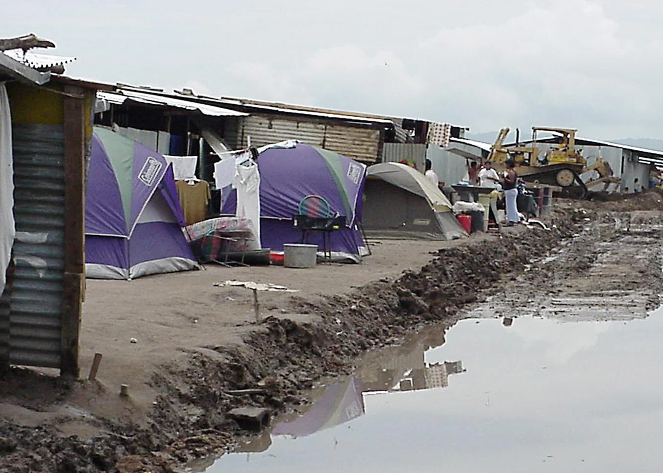 The tent city that people lived in before the new community was built.