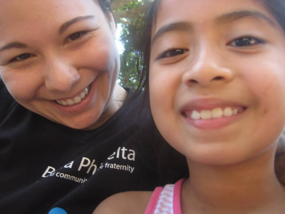 Allyson and one of the village children in Chiltiupán, El Salvador.