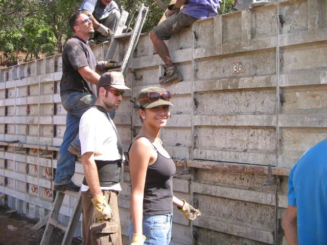 Michael and Zuze's daughter joins the volunteers.