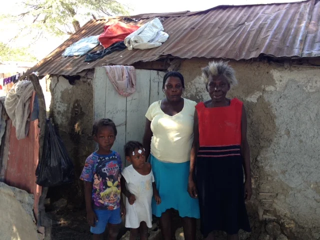   Grandma Alize Jean with her daughter and two grandchildren.  