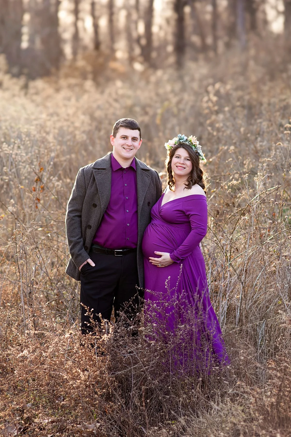 Expecting couple smiling together in a golden meadow at The Carillon, Richmond VA, Sarah Kane Photography