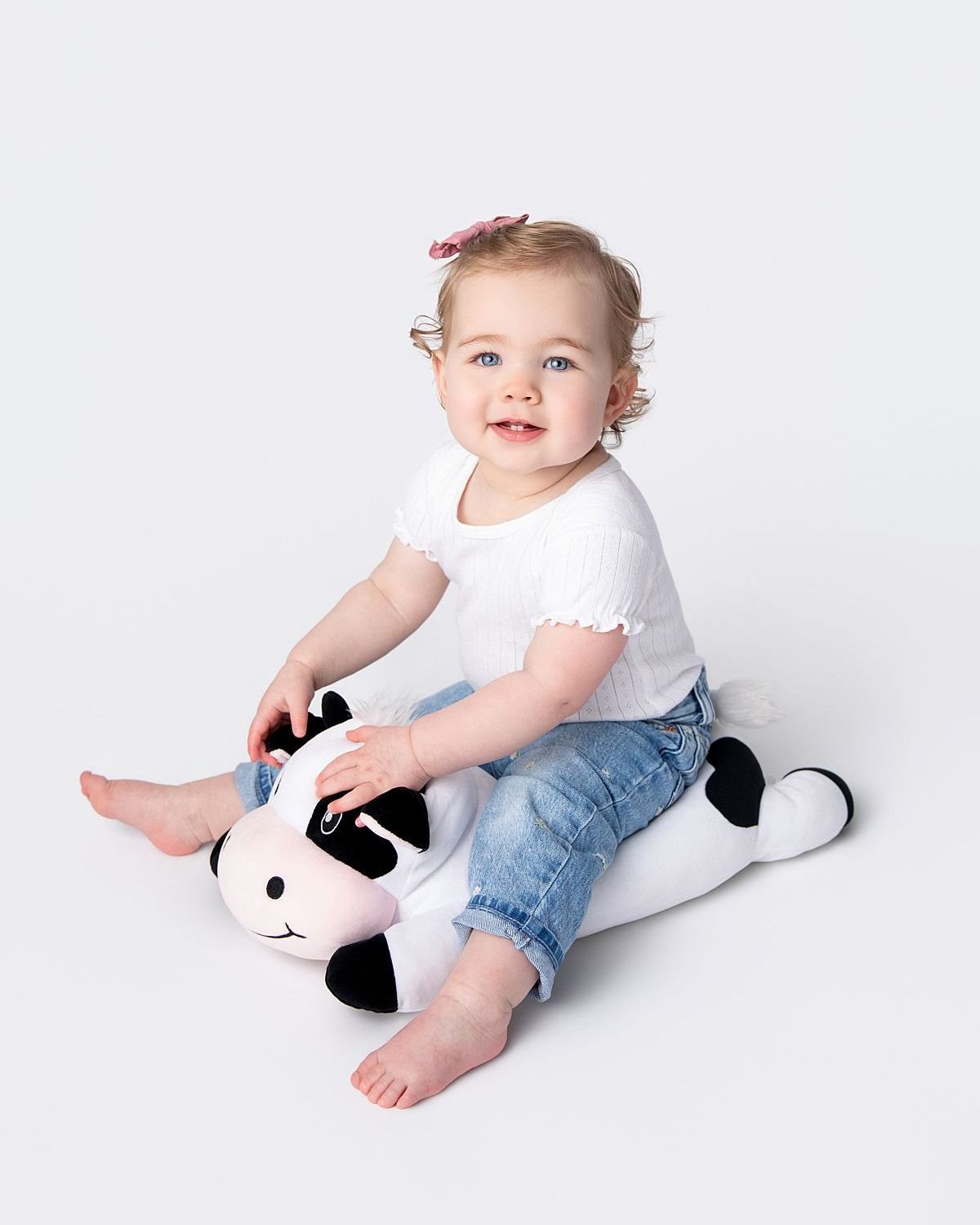 They say time flies, but it's moments like these that let us hit the pause button. Watching this sweet girl explore the studio, reminds me why I love what I do. 
Every milestone, the first teeth, the way they hold onto their favorite plushie, the cur