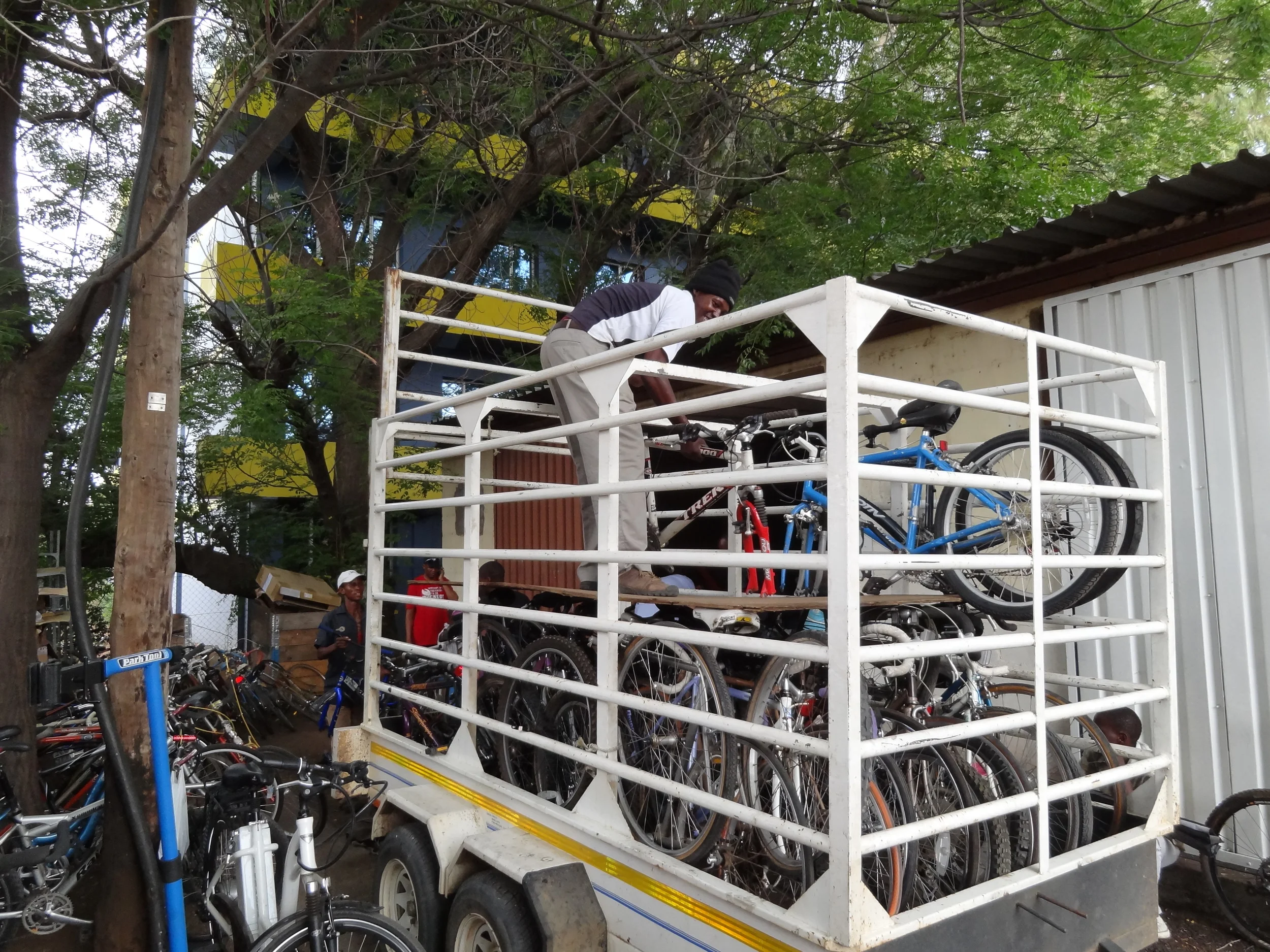 Milton's bike delivery getting loaded