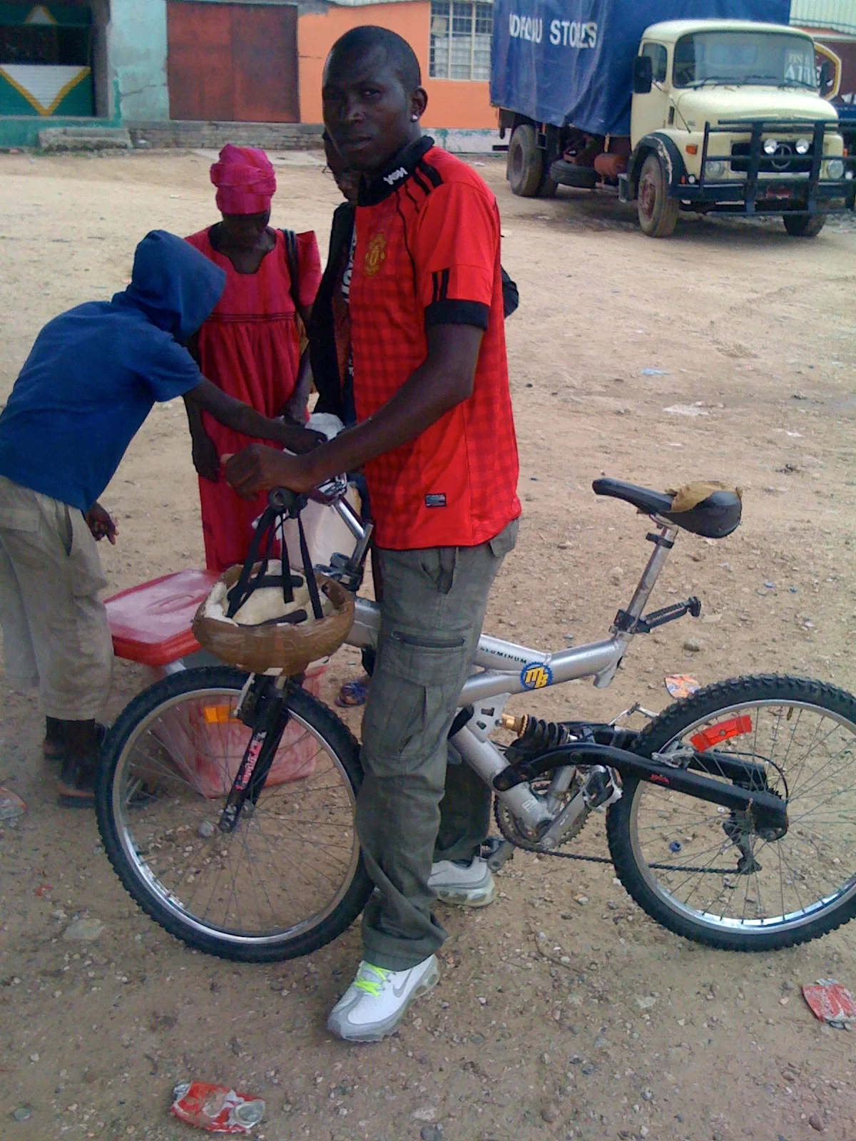 At the market in town, Paul just happened to find this guy on a bike with an MB sticker on it. So cool!