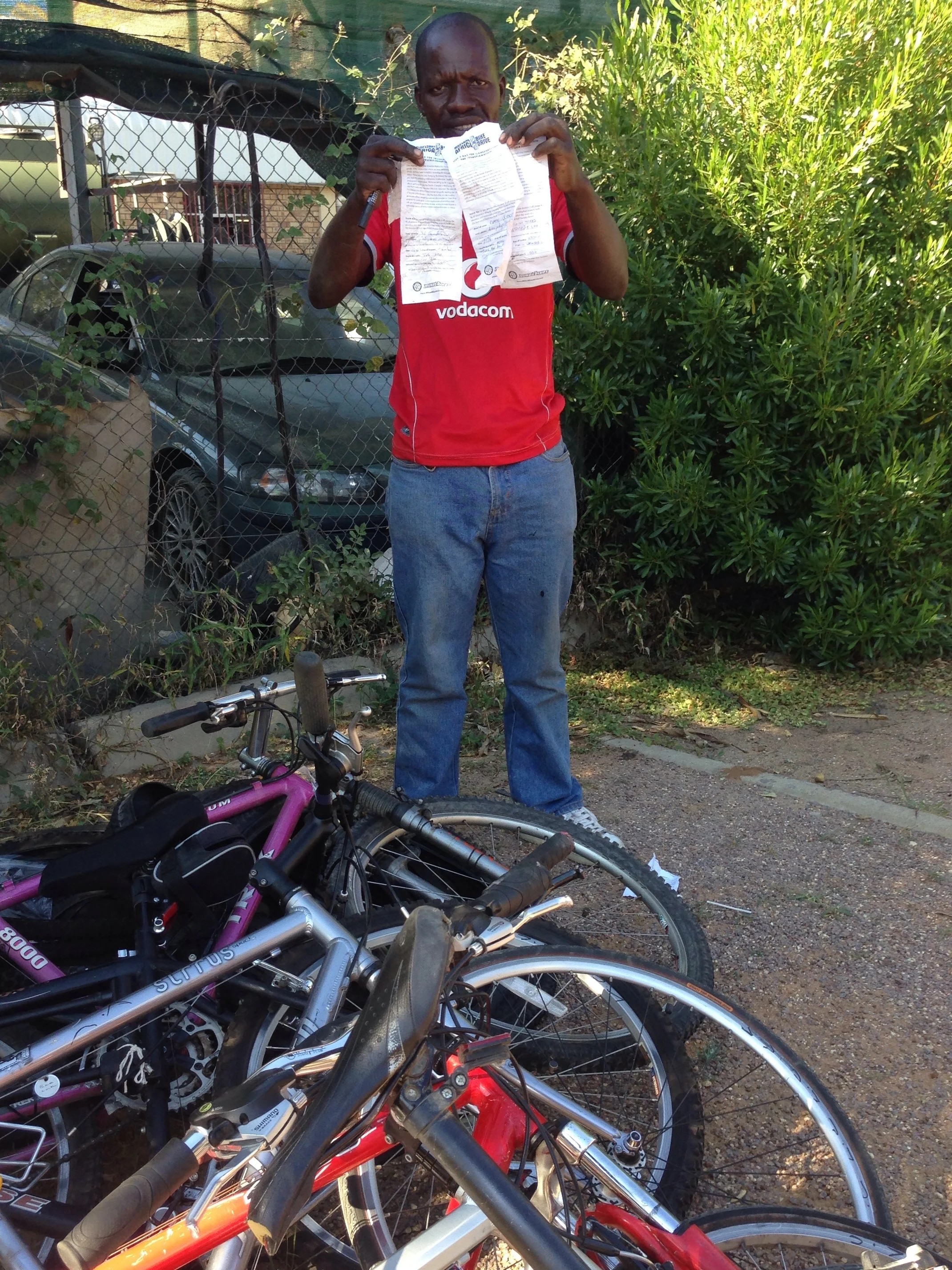 Lovemore with his new stock and slips from our bike donors in California.