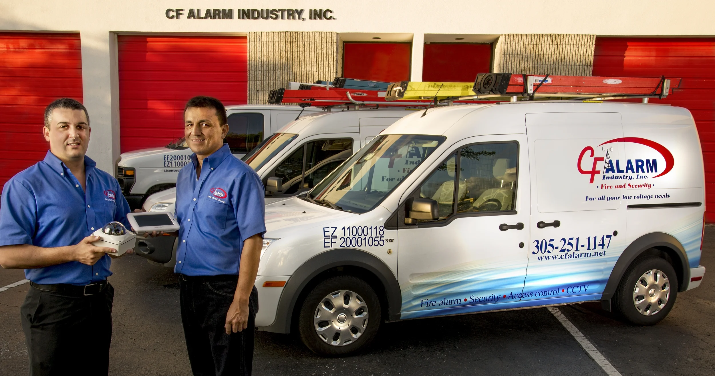 CF Alarm Techs w Vans 1.jpg