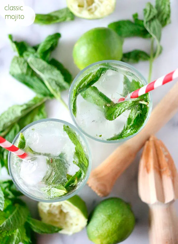 I absolutely love a good, classic mojito. But, if you wanna add a little summery spin to it, switch out your basic rum for coconut rum, yum! What you need: 6 mint leaves // 1 lime, cut in half // 1-1/2 teaspoons Truvia Spoonable (I prefer simple syrup) // 2 ounces coconut rum // Ice // Seltzer water