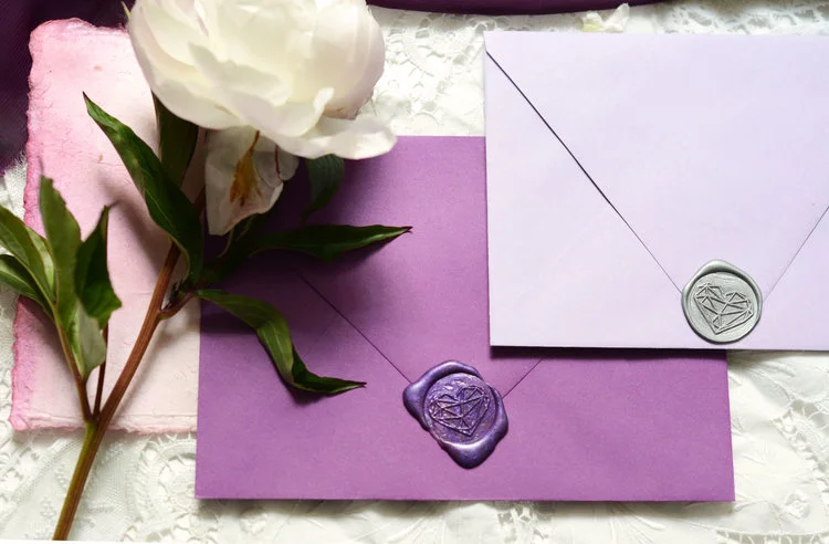 Plum and lilac envelopes wax seals