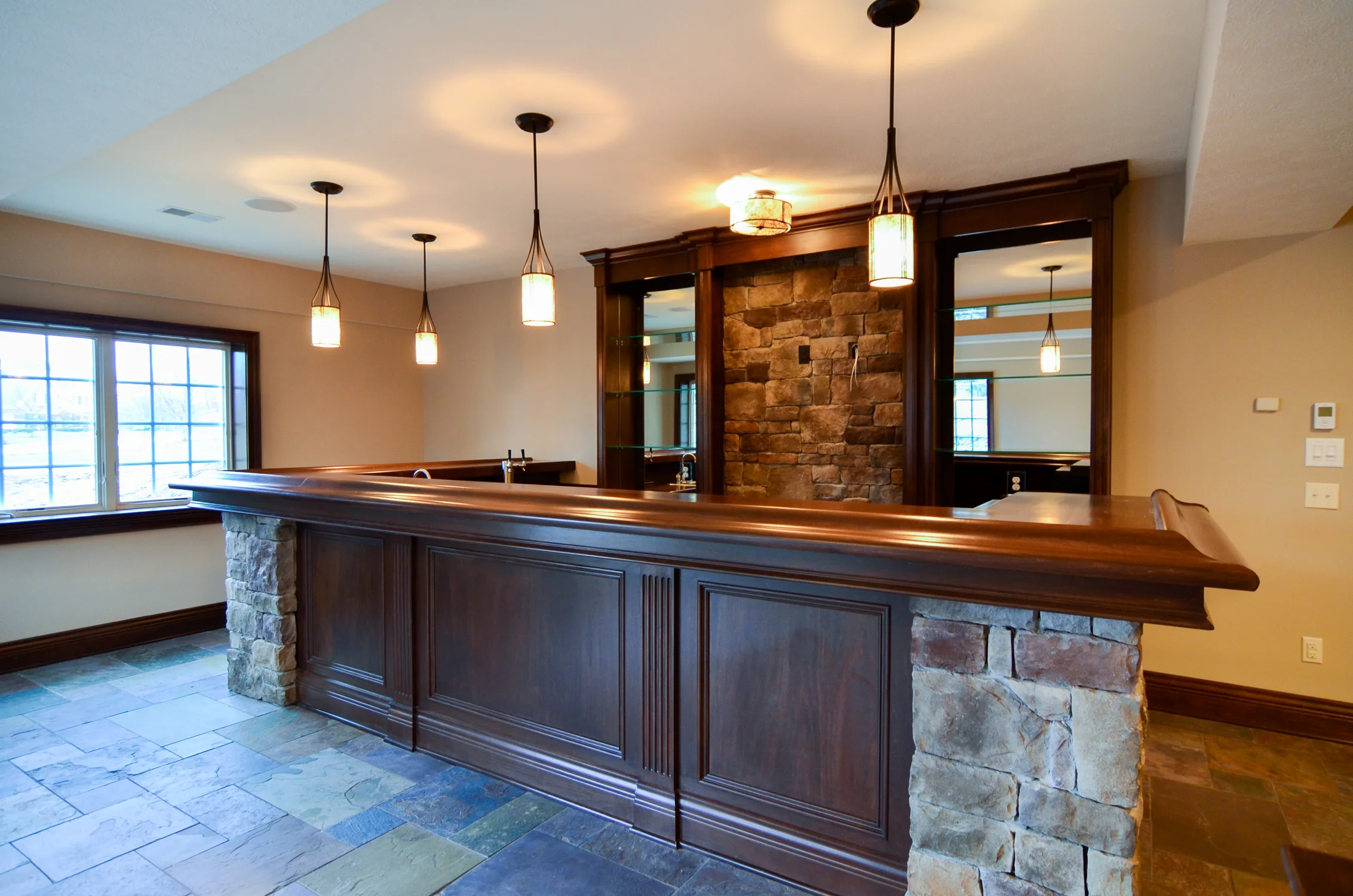 Custom built bar in the finished basement