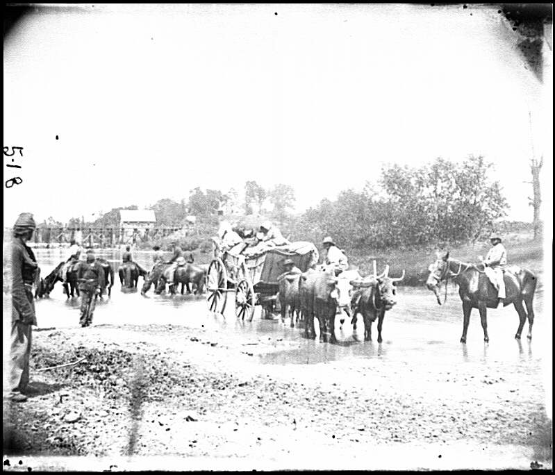 Rappahannock River, Va. Fugitive African Americans fording the Rappahannock , photographed by Timothy H. O’Sullivan, August 1862, public domain