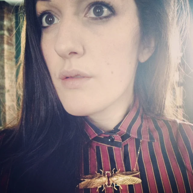 tyramin fighting cicada necklace.JPG