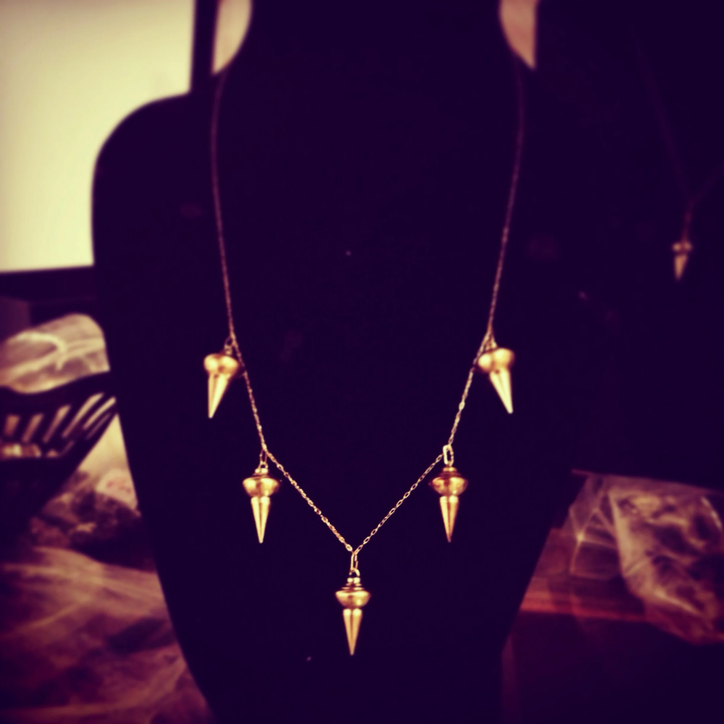 tyramin quinate necklacein brass.JPG