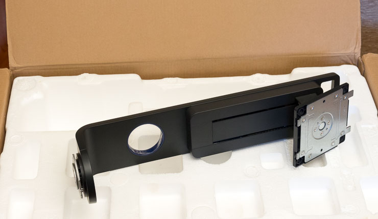 First out is the support arm packaged in styrofoam.