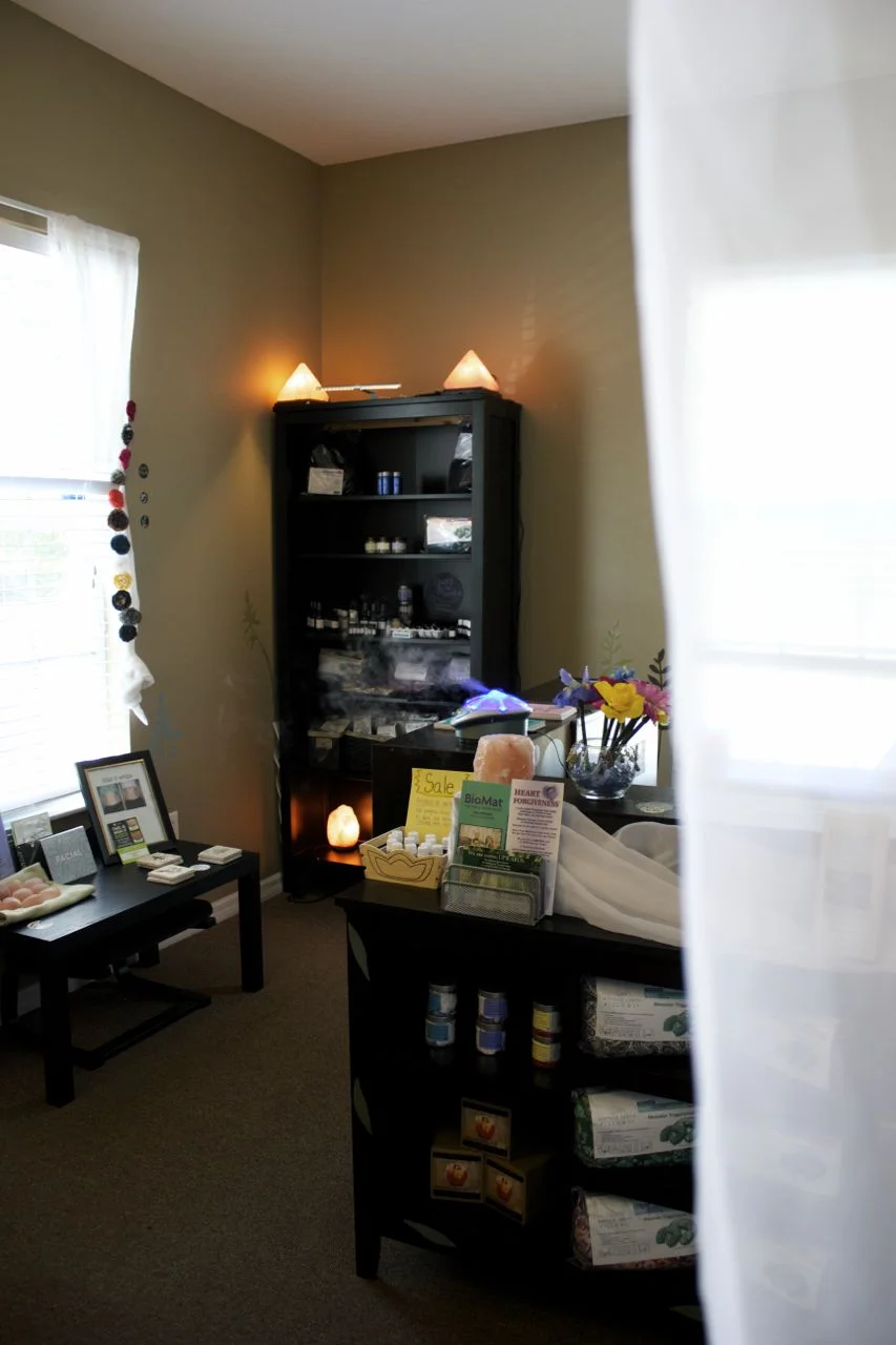 Here's what it's like to look in from right outside our door. We had gotten our salt lamps in by this picture. The colorful circles by the window are locally handmade flower barrettes. Super cute for all ages. 