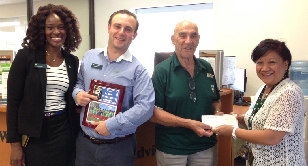Jack Blasutti, Business Manager, receiving sponsorship cheque from TD Canada Trust (Rathburn/Renforth Mall location). Thank you!