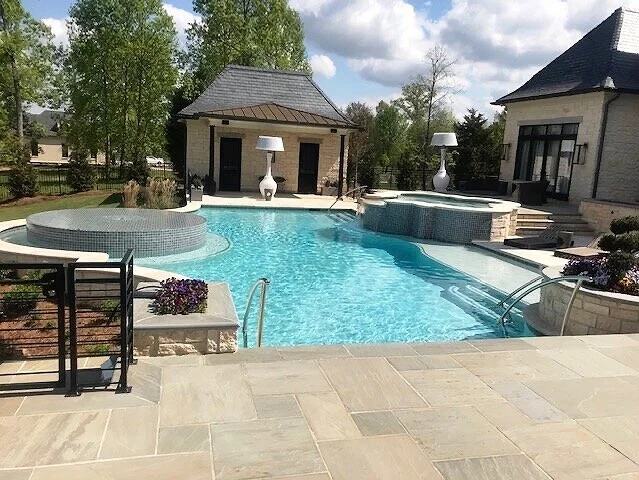 Pool+Coping+%2B+Built+Planters+%2B+Cut+Stone+Flooring.jpg