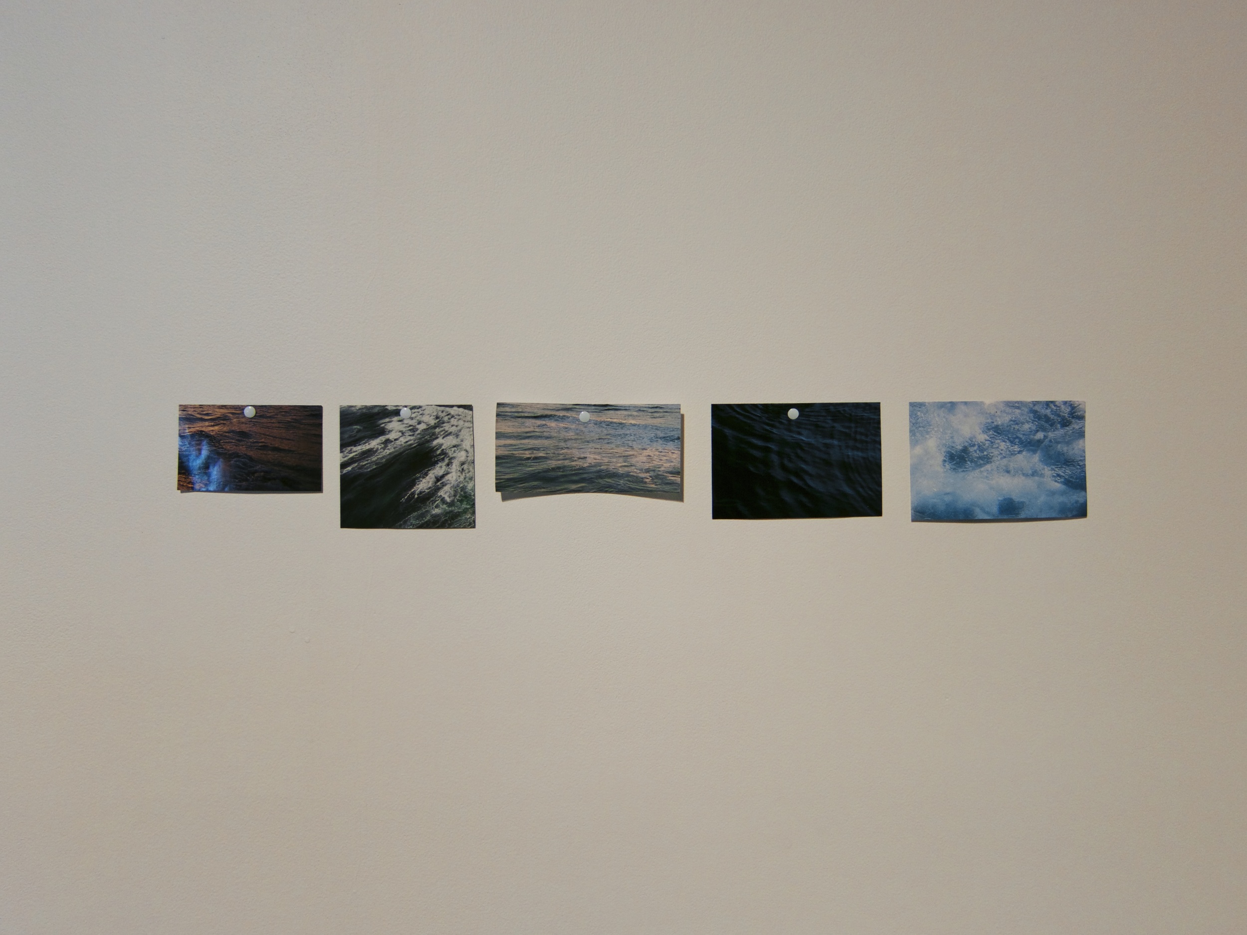  Pinned cut out National Geographic images of water, 20x6 inches, 2014. 