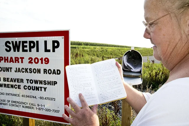 PA farmer Maggie Henry at a drill site by her farm