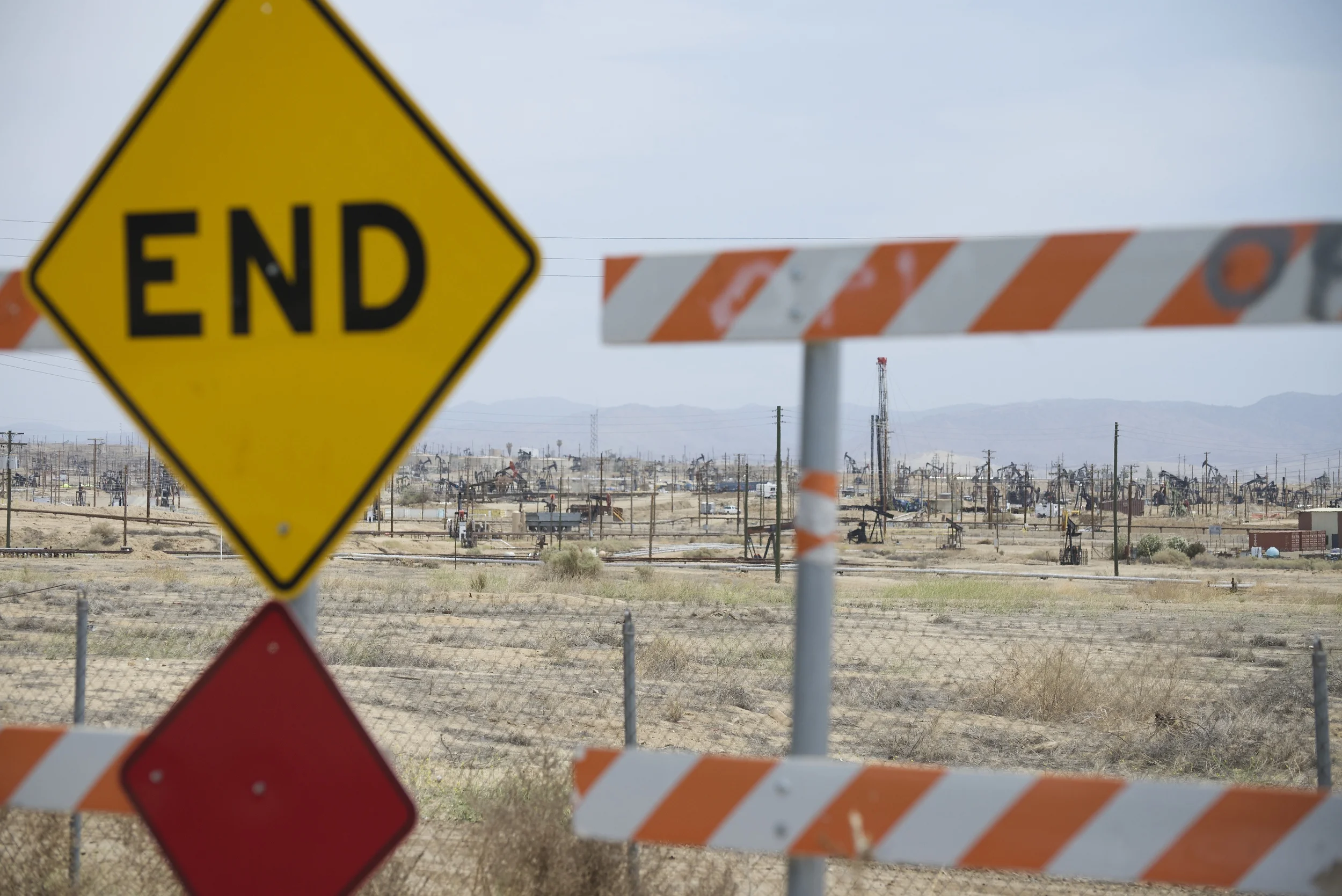 Kern River Oilfield borders residential neighborhood, California.