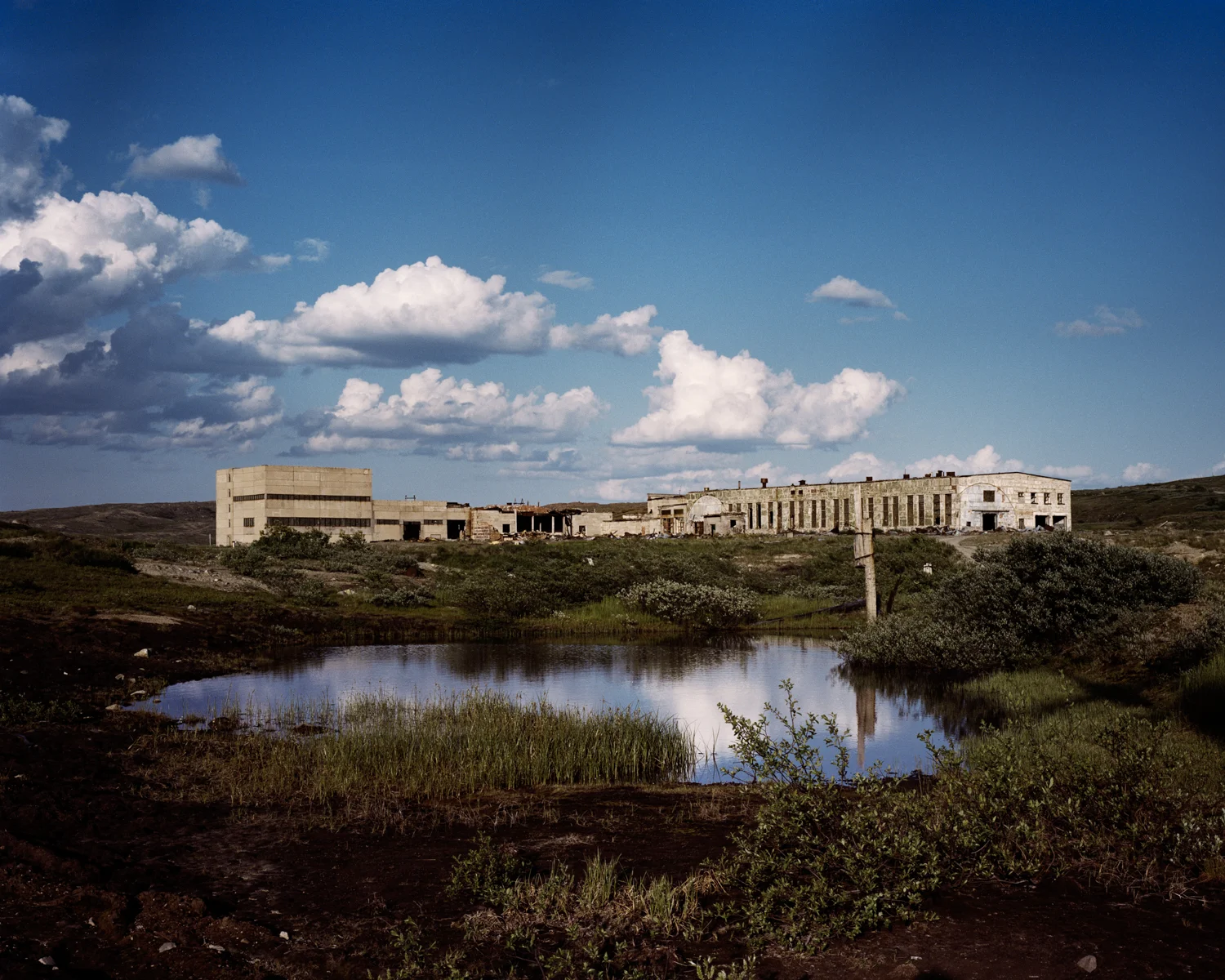 The building complex at the drill site, which shut down in 2005. It has since been raided for scrap metal.