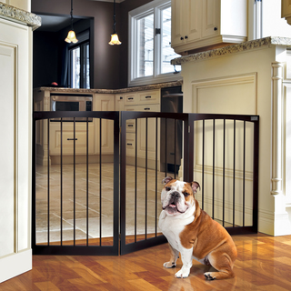Baby gates are great ways for dogs to see, smell, and hear each other without having a chance to interact physically. Photo courtesy of overstock.com