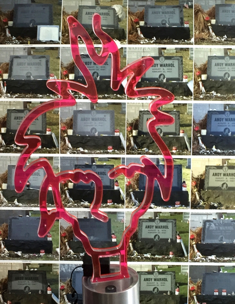 Andy's neon sign in front of a giant contact sheet print made for the Three Rivers Arts Festival 2015