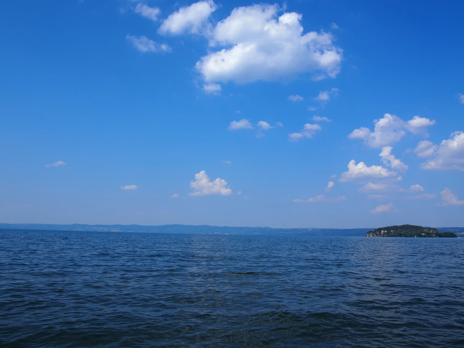Lake Bolsena from Marta, a caldera formed by the Vulsini volcano complex. I only just discovered that you can take a ferry to one of the islands... maybe next year.