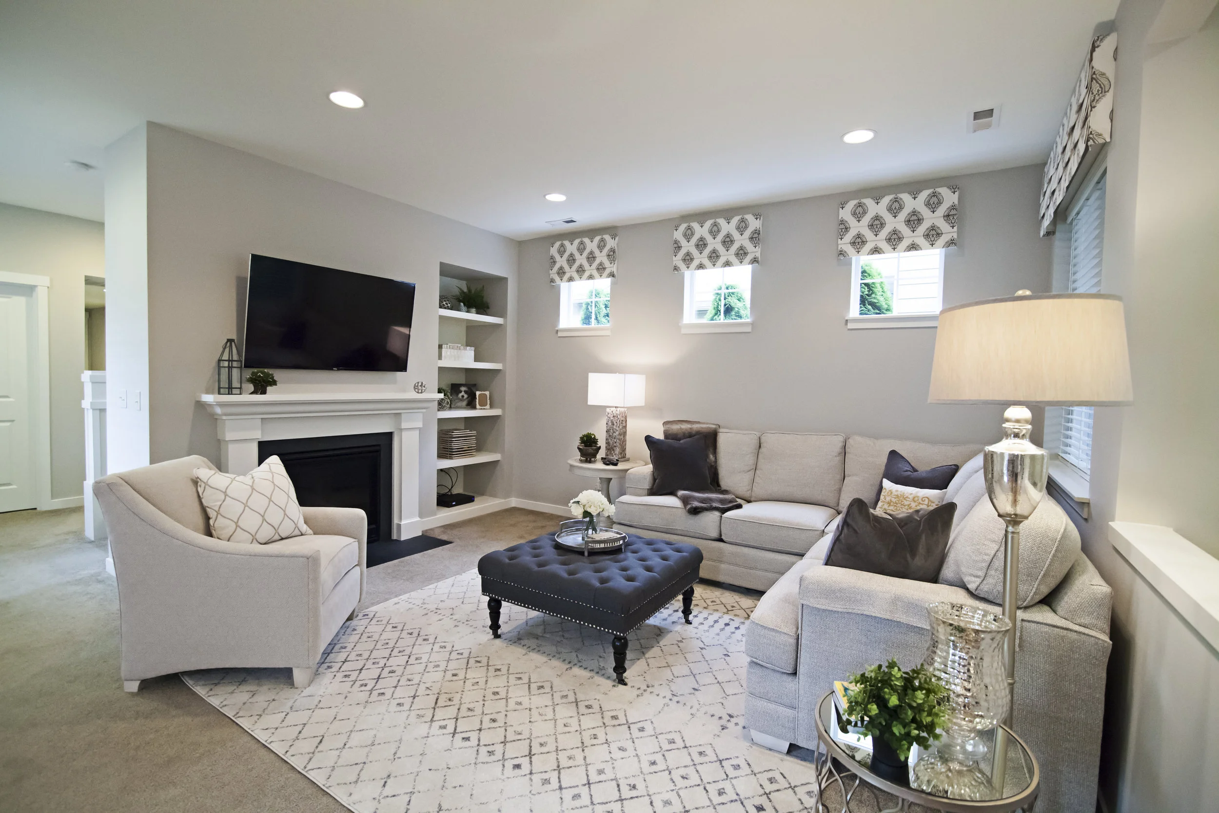 After: new furnishings, rug, accessories, window coverings, paint