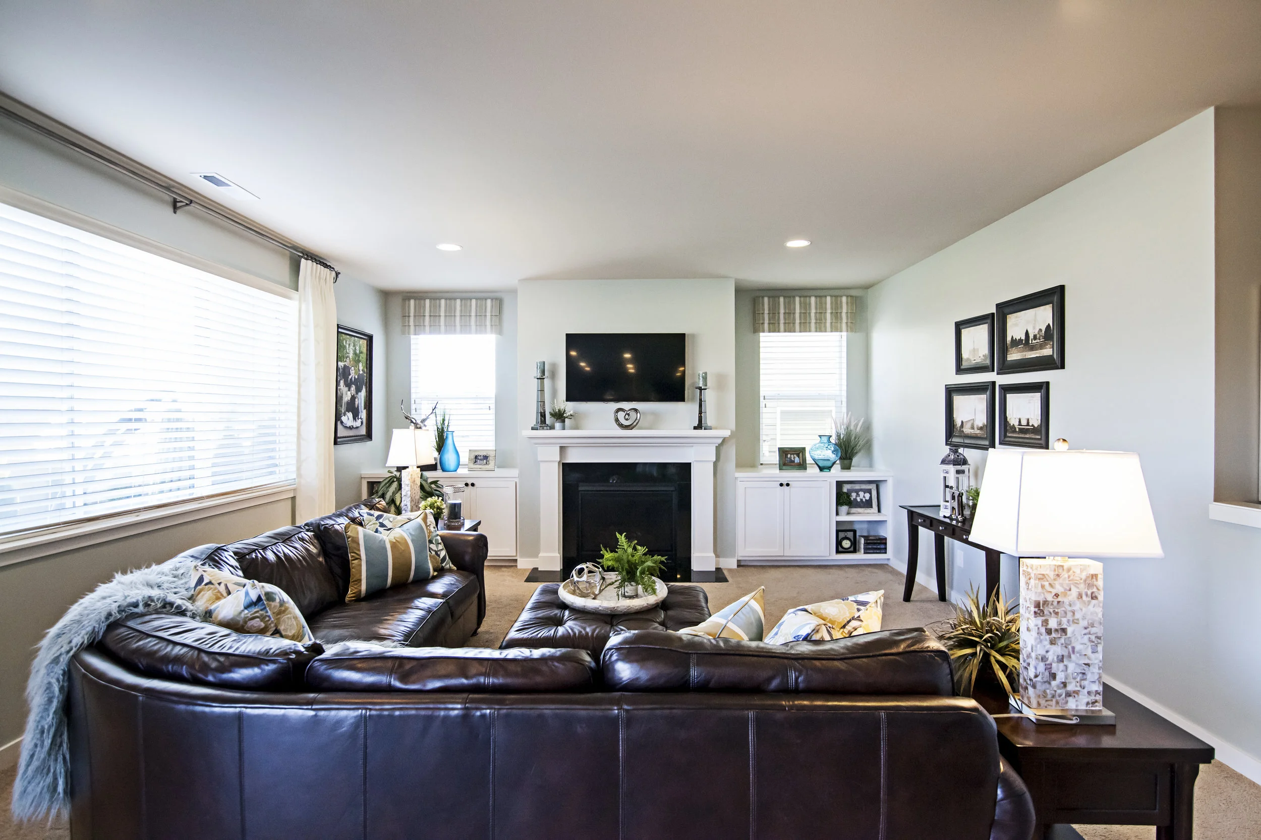 After: furniture moved, accessories, pillows, window coverings -- now, their paint color sings!