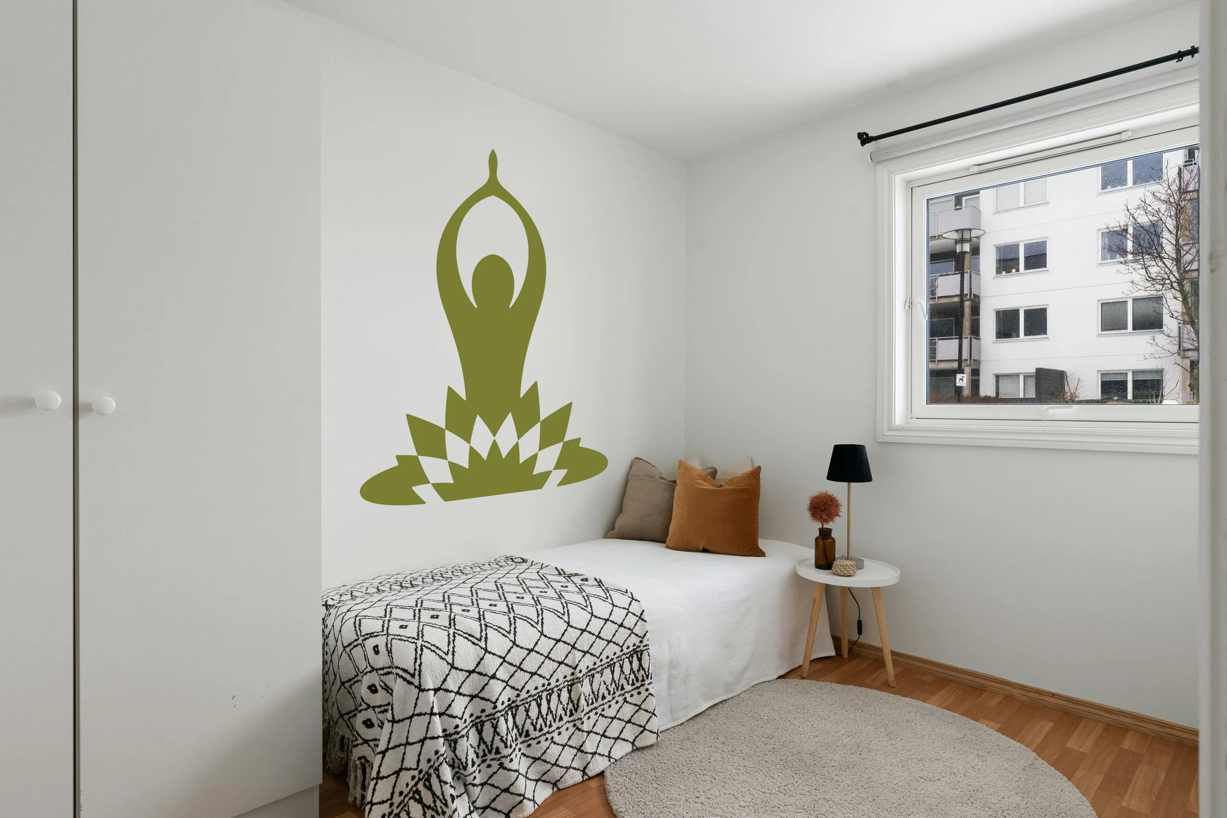 Yoga pose with lotus flower removable vinyl wall decal in olive green.
