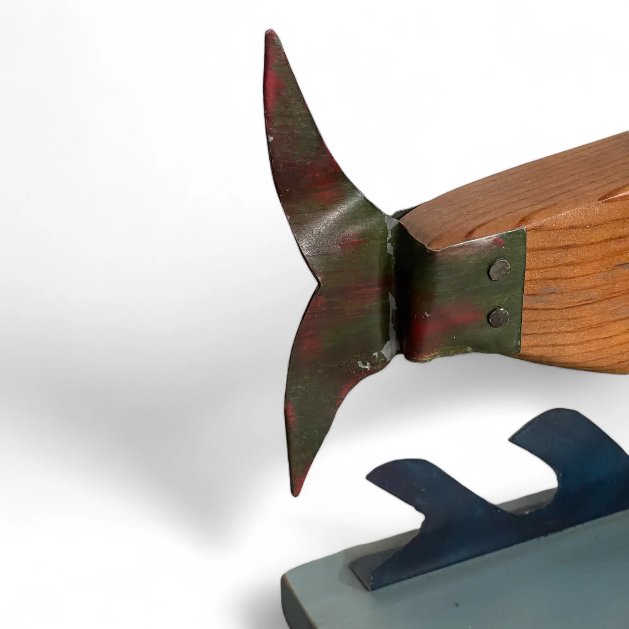 A set of vintage fish bookends crafted from wood and metal, measuring 17 inches wide x 8 inches tall, perfect for whimsical nurseries,  or rustic lodge and cabin decor.