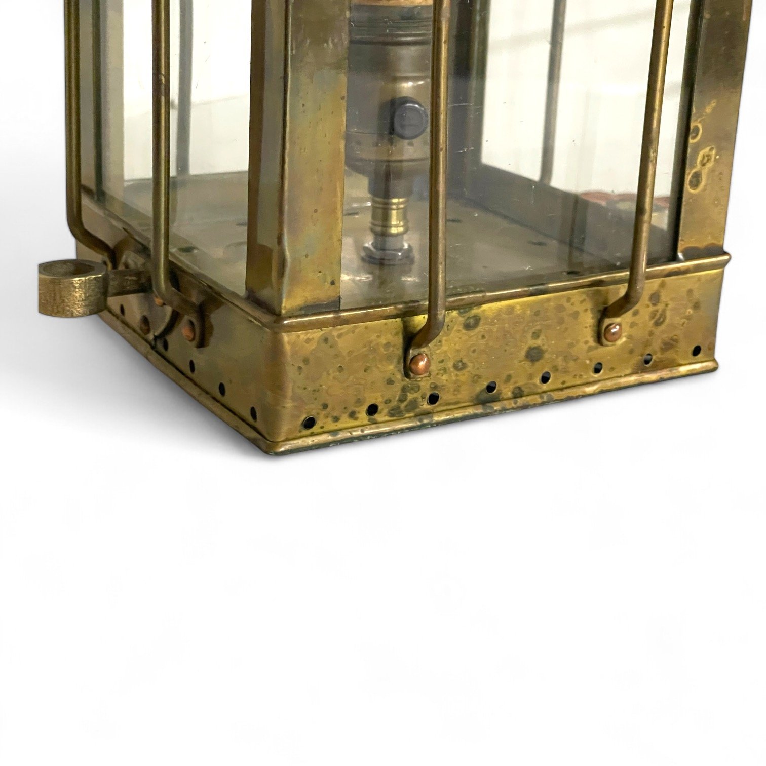 Vintage brass nautical ship cargo lantern repurposed into a light.