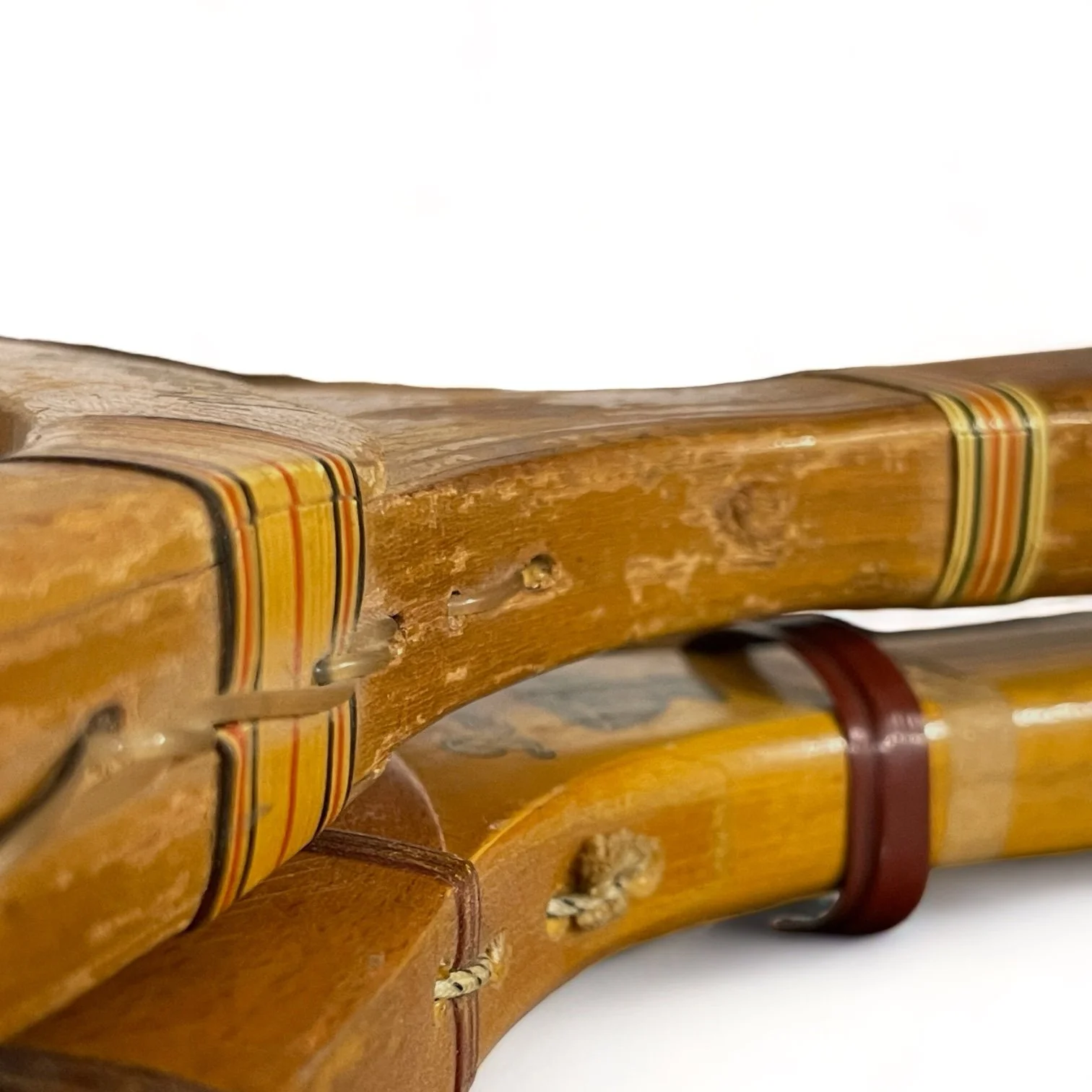 Vintage pair of wooden tennis rackets by Wright & Ditson and Playrite with wood press and canvas covers.