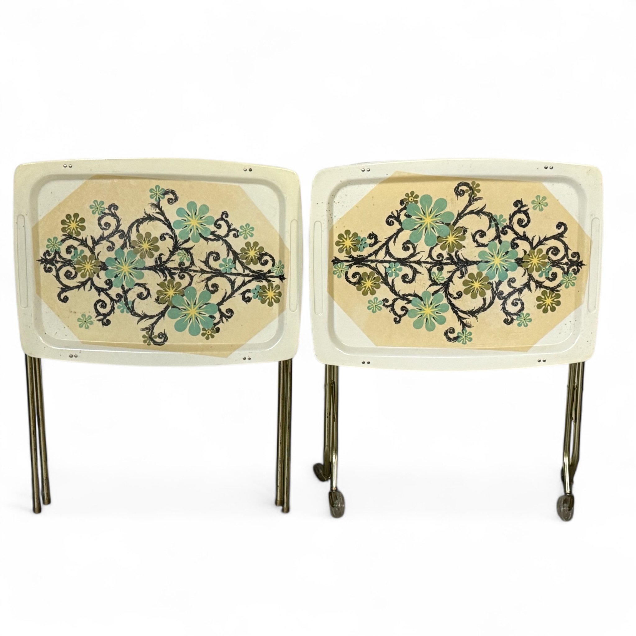 Pair of floral vintage fiberglass mid century folding TV trays with colorful flower design and metal legs.