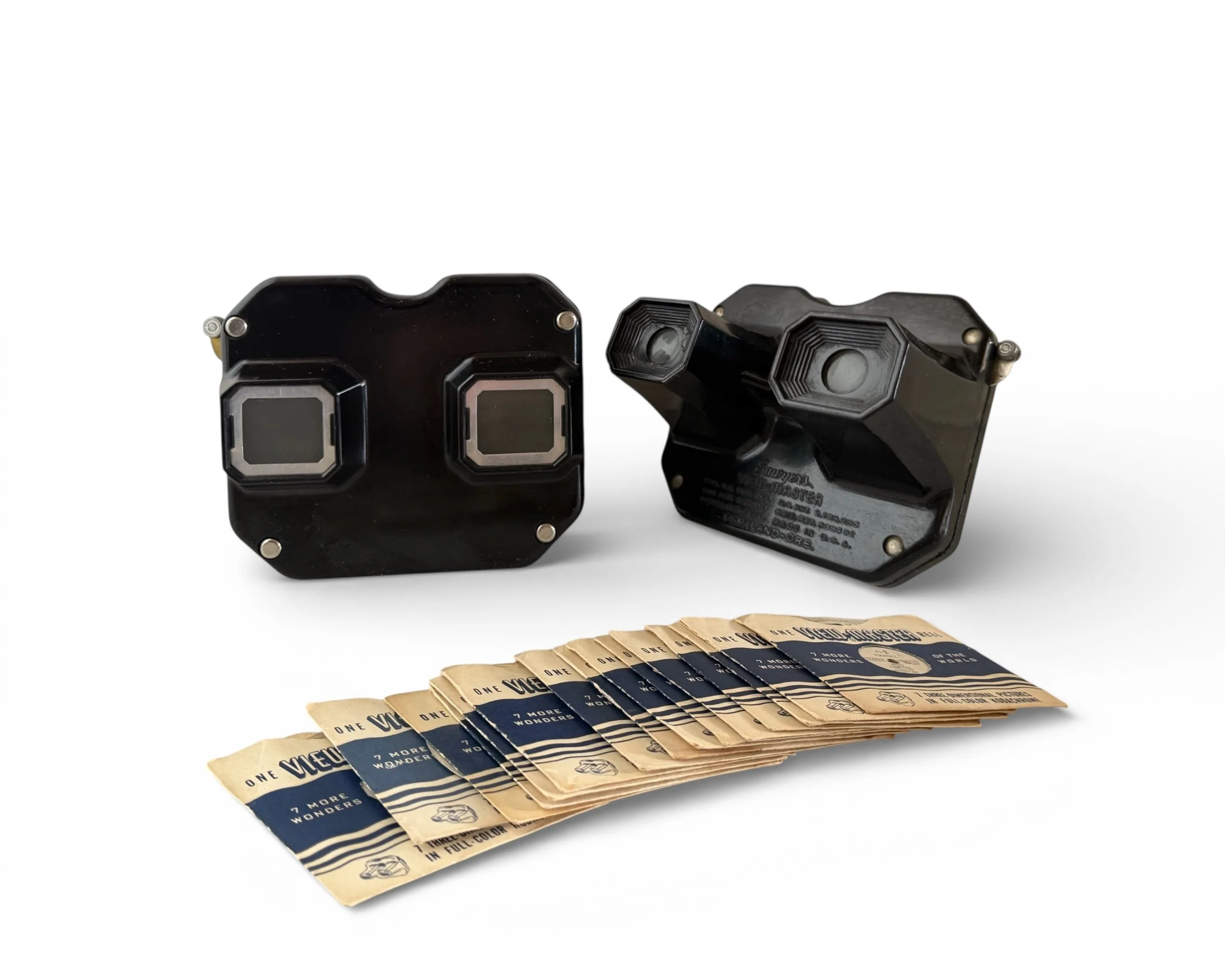 Vintage pair Sawyer’s View-Master Bakelite stereoscopic viewer with 15 reels included