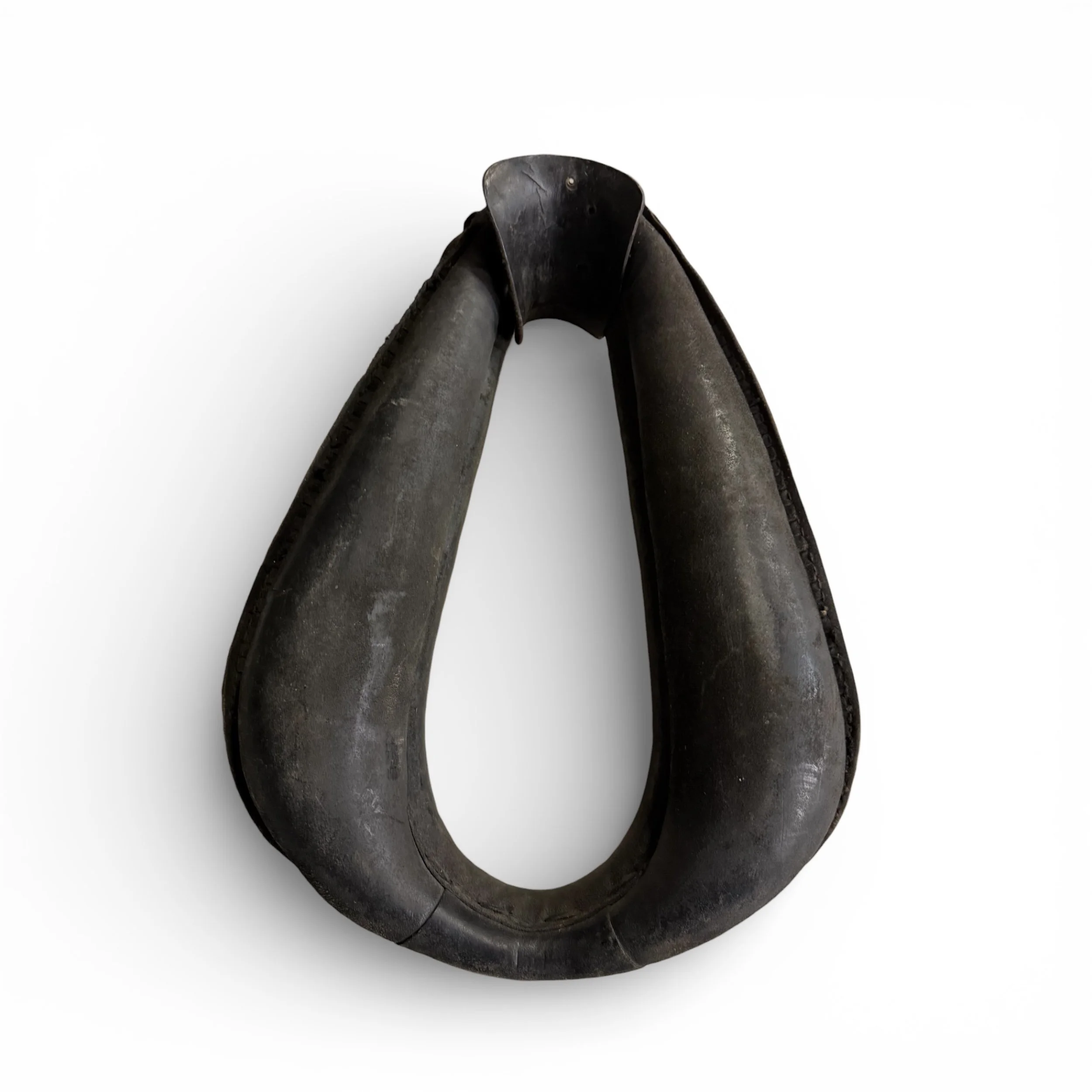 back view of antique leather horse collar for wall decor